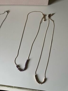 Gold necklaces with beads